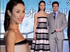 olga kurylenko dispels a common myth as she proves horizontal stripes do not make you look bigger